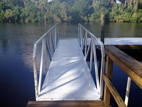 aluminum floating dock leading into a 90 degree angle 