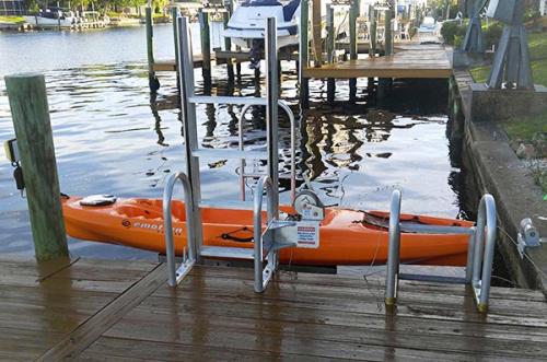 orange kayak on kayak launch